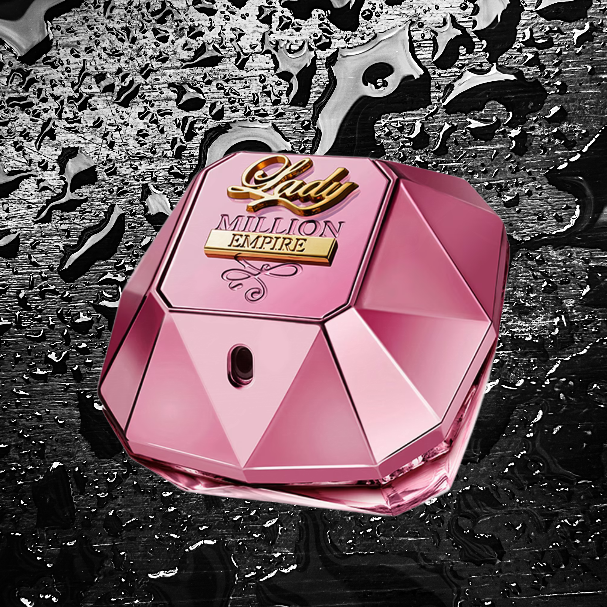 Paco Rabanne Lady Million Empire Eau de Parfum Pink perfume bottle with gold accents on a black and silver background
