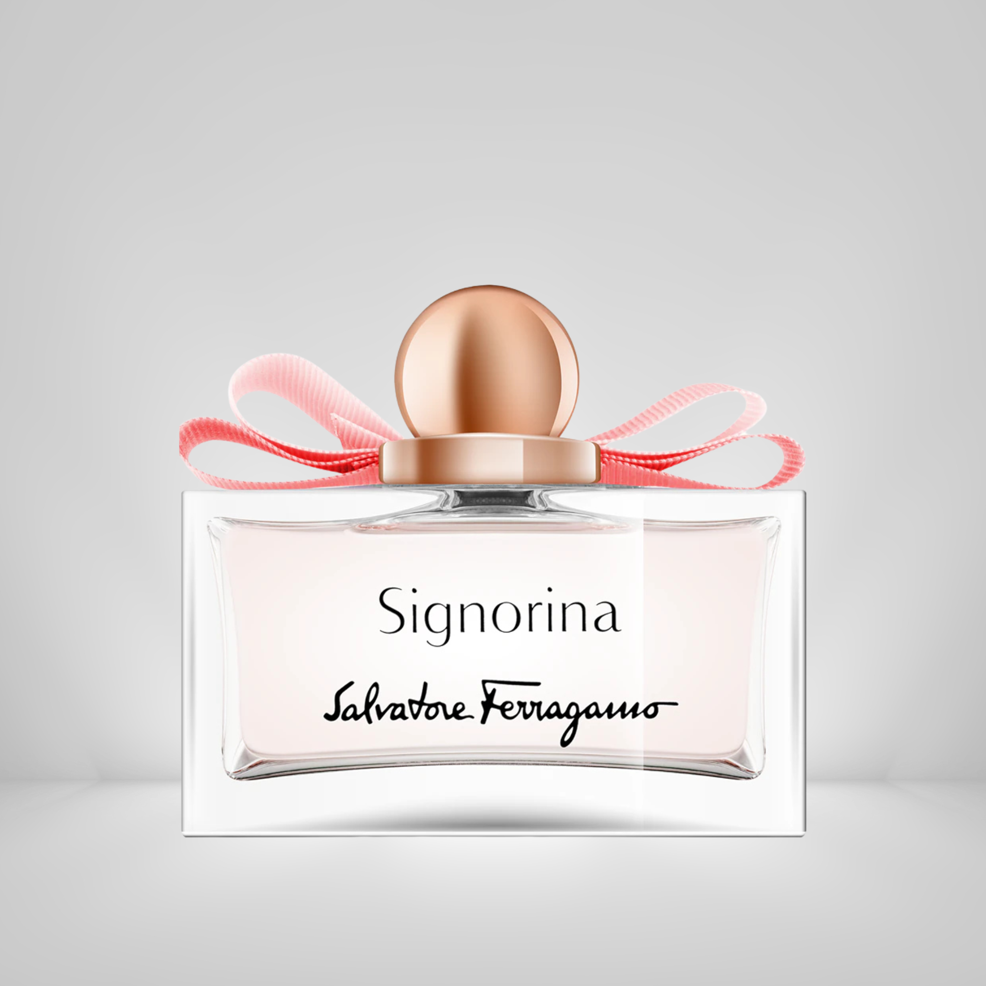 Salvatore Ferragamo Signorina perfume bottle with pink ribbon on a light gray background