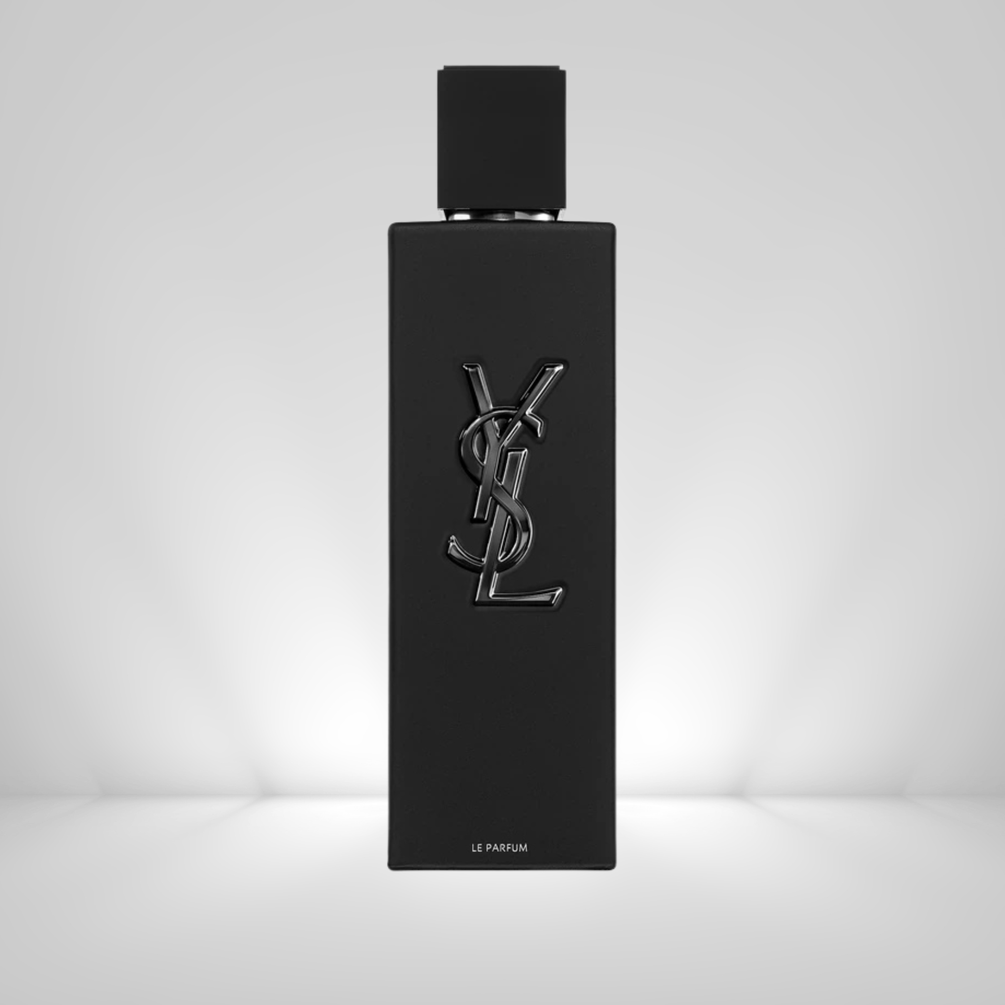 Black YSL perfume bottle on a light gray background